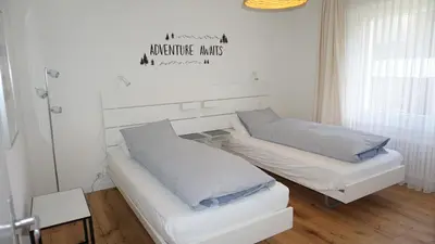 Ein Bett oder Betten in einem Zimmer der Unterkunft Alpine Nest Crans-Montana