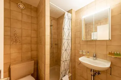 Ein Badezimmer in der Unterkunft Zermatt - well located and equipped studio