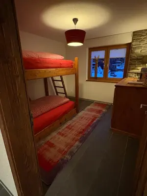Ein Bett oder Betten in einem Zimmer der Unterkunft Swissalpschalet 6 PRO renovated - Same place as Swissalpschalet 4-5