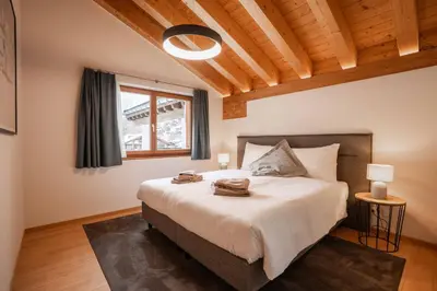 Ein Bett oder Betten in einem Zimmer der Unterkunft Turuwang Penthouse by HomeFlow