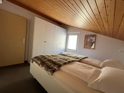 Ein Bett oder Betten in einem Zimmer der Unterkunft Haus Anis Edel Alpine Apartment