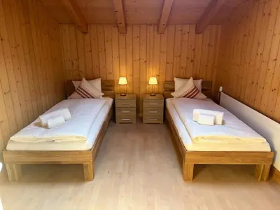 Ein Bett oder Betten in einem Zimmer der Unterkunft Villa Eiger Close to Grindelwald