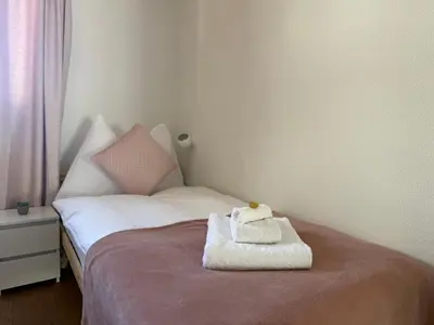Ein Bett oder Betten in einem Zimmer der Unterkunft Mountain Glow Apartment