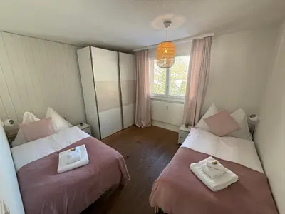 Ein Bett oder Betten in einem Zimmer der Unterkunft Mountain Glow Apartment