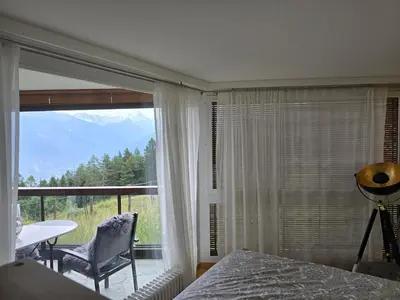 Ein Bett oder Betten in einem Zimmer der Unterkunft Studio Cosy à Crans-Montana