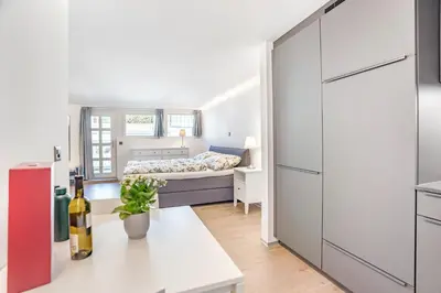Ein Bett oder Betten in einem Zimmer der Unterkunft Completely renovated, furnished studio with plenty of comfort