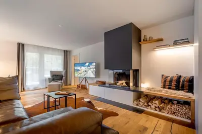 Ein Sitzbereich in der Unterkunft Alpine Lodge 63