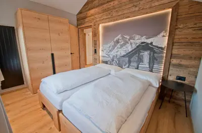 Ein Bett oder Betten in einem Zimmer der Unterkunft Aletschhorn, Chalet Wiedersehen