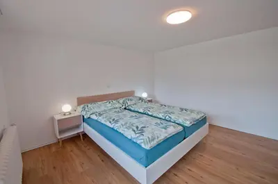 Ein Bett oder Betten in einem Zimmer der Unterkunft Bishorn, Chalet Wiedersehn