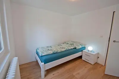 Ein Bett oder Betten in einem Zimmer der Unterkunft Bishorn, Chalet Wiedersehn