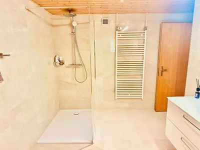 Ein Badezimmer in der Unterkunft Scenic Stay Grindelwald Interlaken & Lauterbrunen