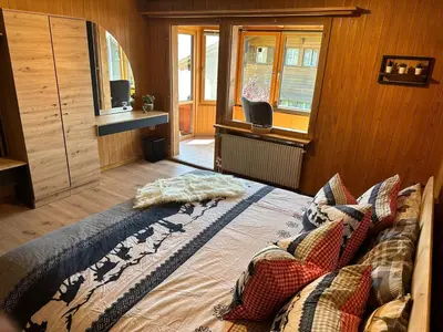 Ein Bett oder Betten in einem Zimmer der Unterkunft Chalet Zytrösli