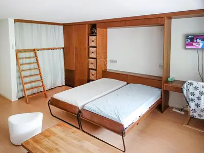 Ein Bett oder Betten in einem Zimmer der Unterkunft Apartment Ringstrasse Apt 121 by Interhome