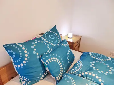 Ein Bett oder Betten in einem Zimmer der Unterkunft Apartment Eisiboden by Interhome