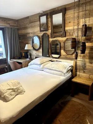 Ein Bett oder Betten in einem Zimmer der Unterkunft Zermatt Apartment