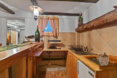 Küche/Küchenzeile in der Unterkunft Maison Crans-Montana, 7 pers - 7 lits, Jardin & Carnotzet