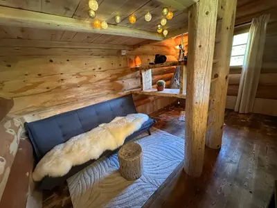 Ein Sitzbereich in der Unterkunft WoodMood Cabin with Spa
