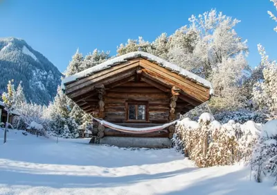 WoodMood Cabin with Spa im Winter