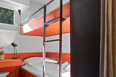 Ein Bett oder Betten in einem Zimmer der Unterkunft Crans-Montana, 5 pers, balcon vue et parking privé
