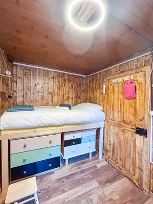 Ein Bett oder Betten in einem Zimmer der Unterkunft Charmant Appartement Alpin