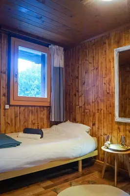 Ein Bett oder Betten in einem Zimmer der Unterkunft Charmant Appartement Alpin