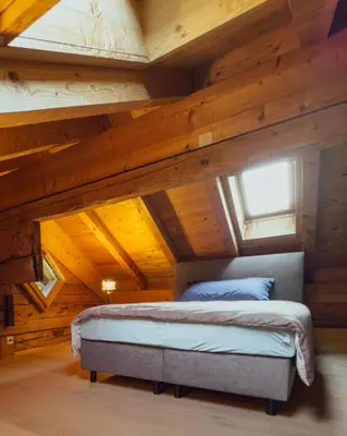 Ein Bett oder Betten in einem Zimmer der Unterkunft Grosszügige Wohnung Leiterli