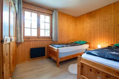 Ein Bett oder Betten in einem Zimmer der Unterkunft Chalet Mon Reve