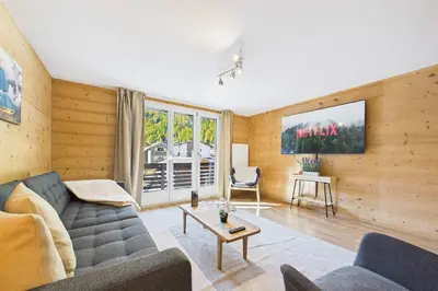 Ein Sitzbereich in der Unterkunft Family-friendly apartment with mountain views