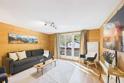 Ein Sitzbereich in der Unterkunft Family-friendly apartment with mountain views