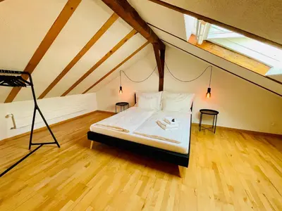 Ein Bett oder Betten in einem Zimmer der Unterkunft -TheUrbanist- Sauna Free Parking Fast WiFi