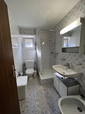 Ein Badezimmer in der Unterkunft Ferienwohnungen in Leukerbad