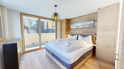 Ein Bett oder Betten in einem Zimmer der Unterkunft Alphubel PEAK