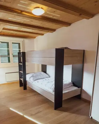 Ein Bett oder Betten in einem Zimmer der Unterkunft Ferienwohnung Metsch