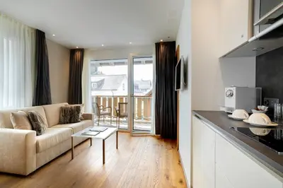 Ein Sitzbereich in der Unterkunft Apartment Crown Andermatt-2