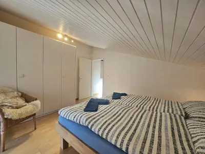 Ein Bett oder Betten in einem Zimmer der Unterkunft Adora