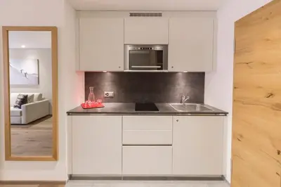 Küche/Küchenzeile in der Unterkunft Apartment Crown Andermatt-7