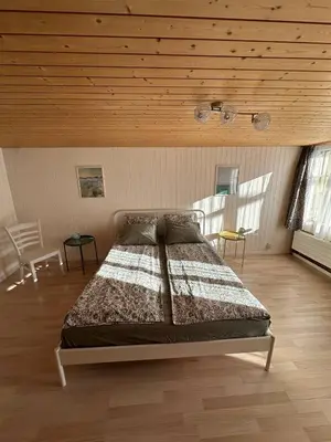 Ein Bett oder Betten in einem Zimmer der Unterkunft Flowerpot Apartment