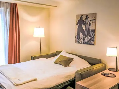 Ein Bett oder Betten in einem Zimmer der Unterkunft Apartment Juliana-3 by Interhome