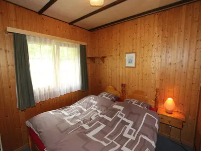 Ein Bett oder Betten in einem Zimmer der Unterkunft Chalet in Valais near Ski Lift & Saas Valley