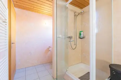 Ein Badezimmer in der Unterkunft Apartment Chalet Condor - Aare Jungfrau AG
