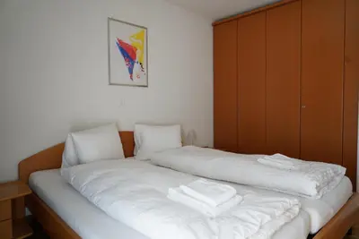 Ein Bett oder Betten in einem Zimmer der Unterkunft Fee-Rien