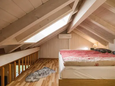 Ein Bett oder Betten in einem Zimmer der Unterkunft Apartment Steamboat Suite in See- und Bergnähe, 4 Gäste, Balkon mit Aussicht