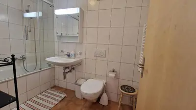 Ein Badezimmer in der Unterkunft Snowfun A