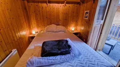 Ein Bett oder Betten in einem Zimmer der Unterkunft Chalet Le Montparnasse - 4 personnes Charmant