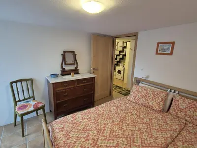 Ein Bett oder Betten in einem Zimmer der Unterkunft Rustico La Stalla di Adele