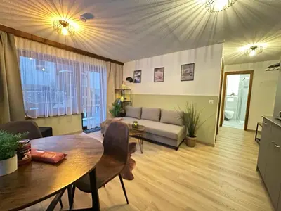 Ein Sitzbereich in der Unterkunft Haus Silence - Berge & Sonne im Saastal Ski Wandern Familie Haustiere