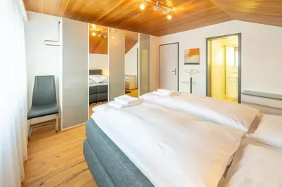 Ein Bett oder Betten in einem Zimmer der Unterkunft Penthouse Matterhorn Vista