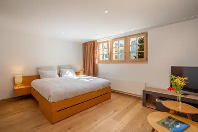 Ein Bett oder Betten in einem Zimmer der Unterkunft Mountain View Studio Adelboden Next to Gondola & Spa
