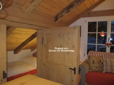 Ein Bett oder Betten in einem Zimmer der Unterkunft Chalet Baba Wengen Apartment LISA