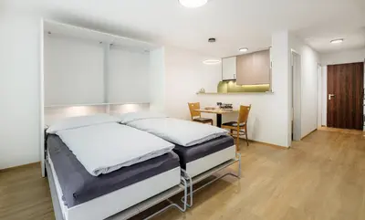 Ein Bett oder Betten in einem Zimmer der Unterkunft Figaro